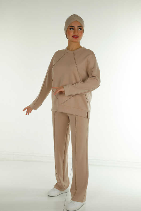 Reel Tekstil - Scuba ve İki İplikten Üretilen Tesettür Eşofman Takım Kristal Taş İşlemeli Kadın Giyim Üreticisi - | Reel Tekstil